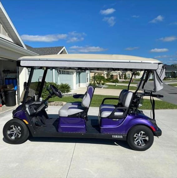 Purple Yamaha with four forward-facing seats